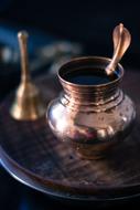 hindu water pot and bell
