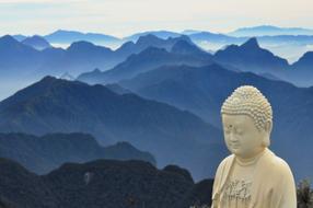statue Buddha and Mountains Blue