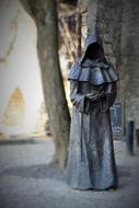 stone statue of a monk