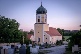 cemetery in front of a village church