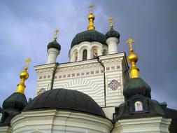 Orthodox church with golden crosses on the domes