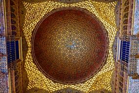 Beautiful and colorful, gold, decorated Arabic dome on the temple
