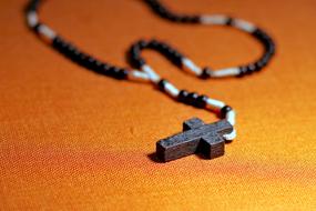 Rosary Prayer Faith orange background