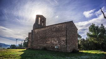 stone old church in the bright sun in nature