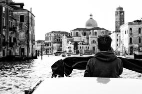 man in boat in Venice