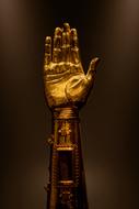 gold hand statue