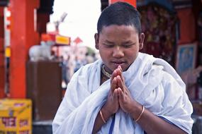 asian Boy Prays
