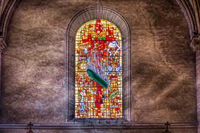 stained glass window of the church on the wall