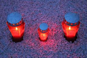 illuminated Three Red Candles