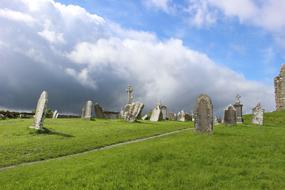 Cemetery Grave and Clouds