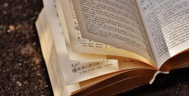scrolling pages of hymnal