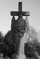 Angel at cross, Gravestone on brompton Cemetery, uk, england, london