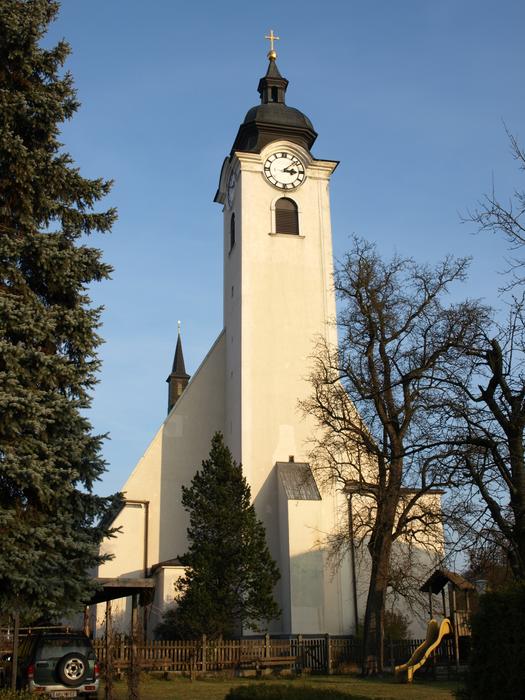 The clock tower of the church