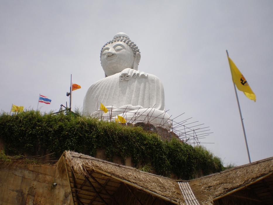 white sacred buddha monument in thailand