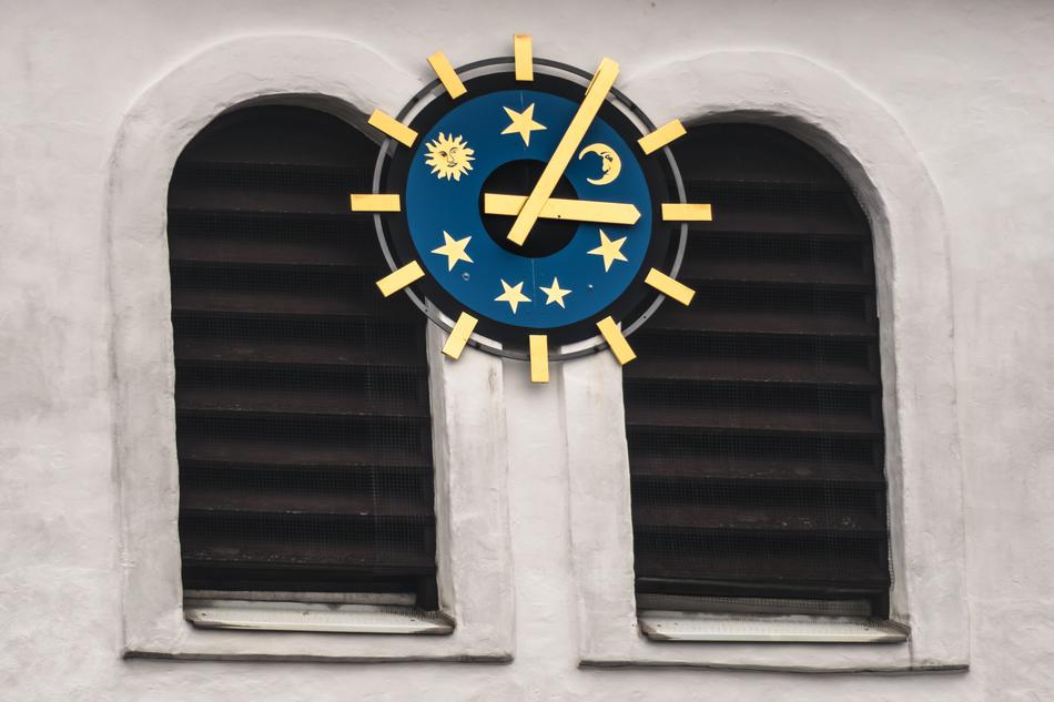 clock with stars on the wall