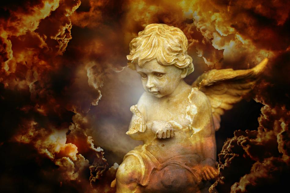 Beautiful Cherub angel, among the orange and yellow clouds