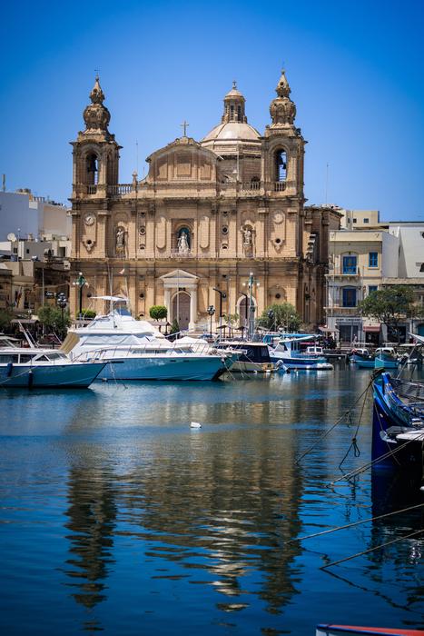 church on the coast of malta on a sunny day