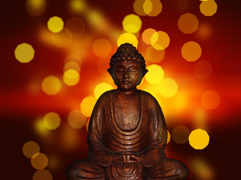 Buddha Statue at bokeh background