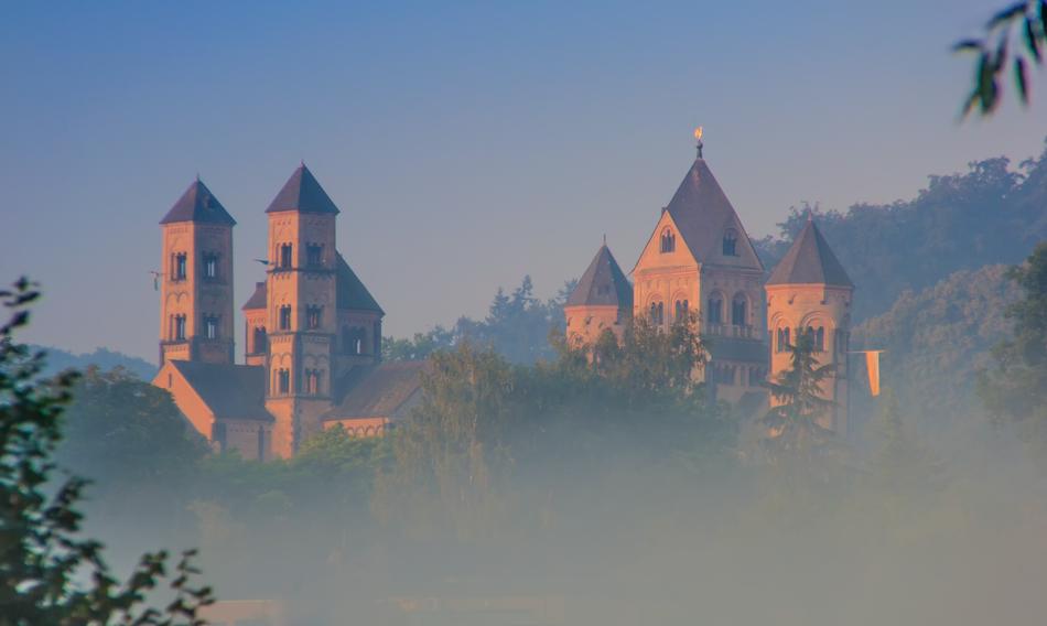 monastery with towers in the fog