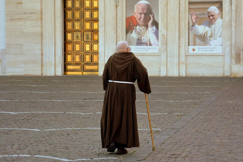 old monk in the square in the vatican