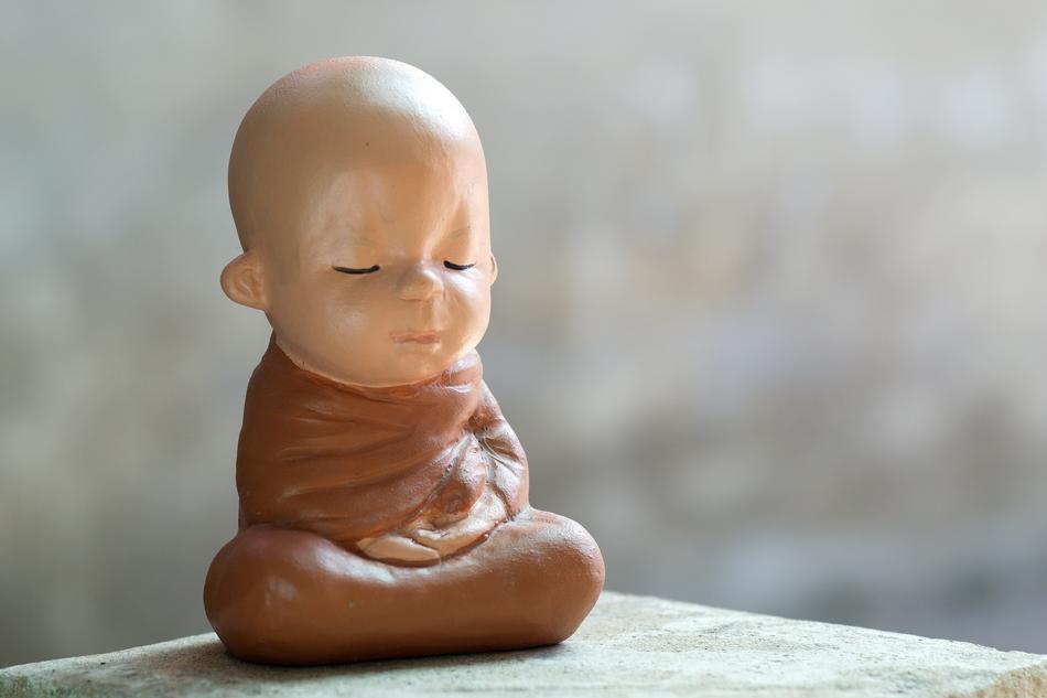 Clay Doll on stone, Neophyte, buddhist monk