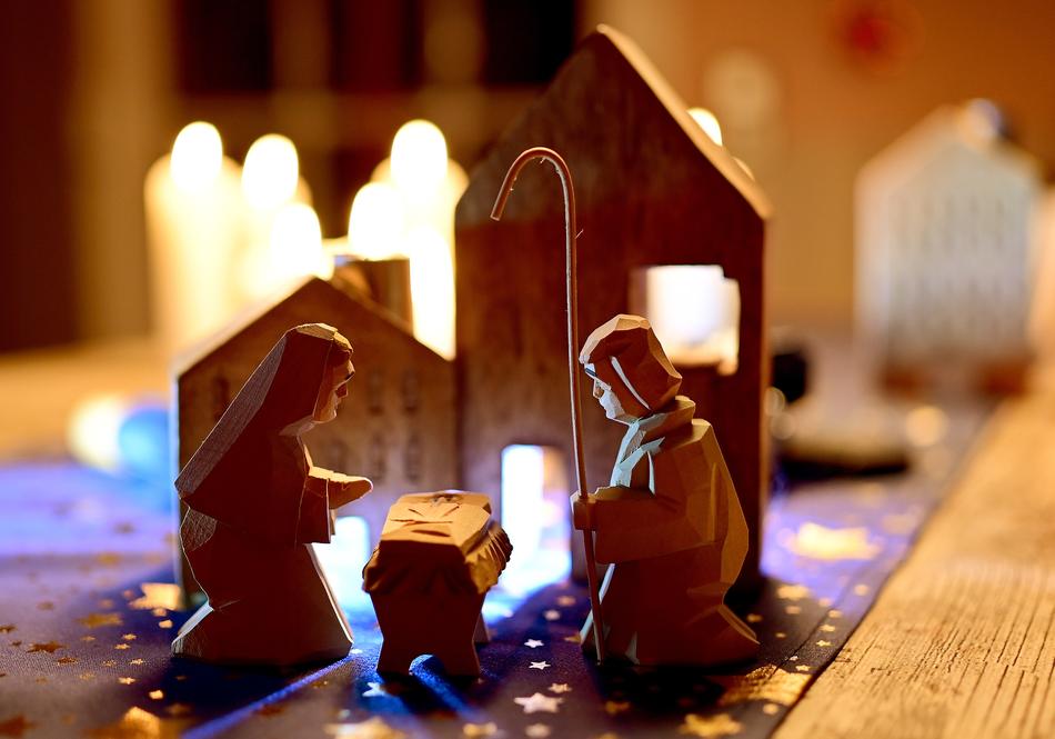 wooden nativity scene for christmas on blurred background
