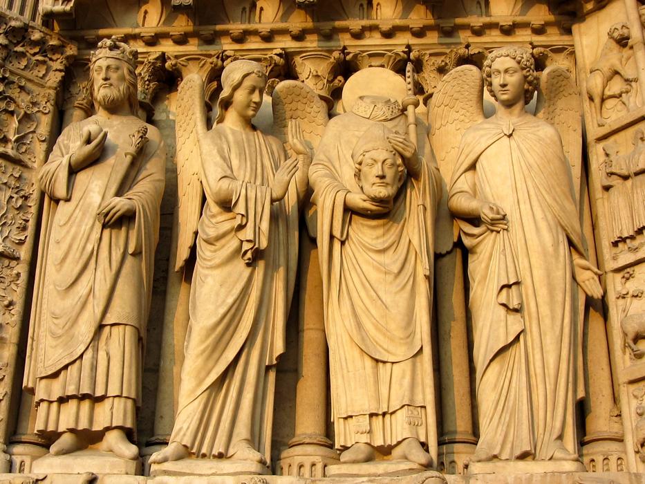 stone figures on the facade of notre dame in paris