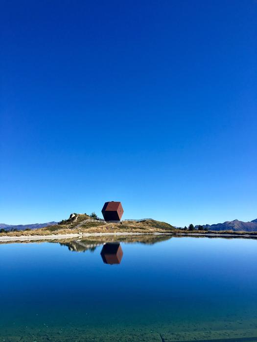 chapel on the mountain near the lake