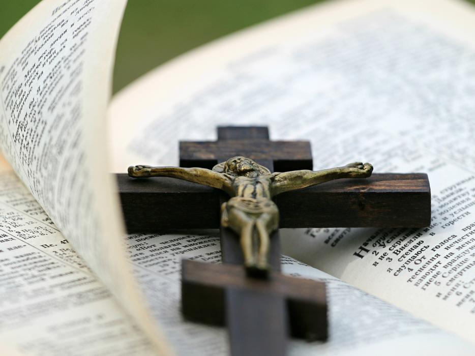 Cross Jesus on Bible book
