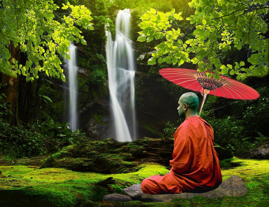 Monk near Waterfall at Nature