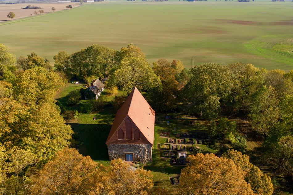 Church in rural Landscape at Autumn, top view