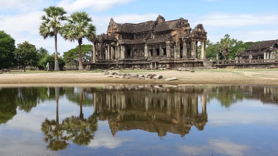 Beautiful old building with the reflection in water