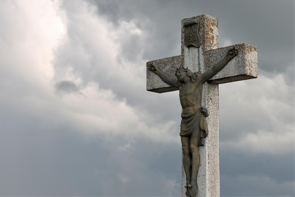dramatic sky above the crucifix
