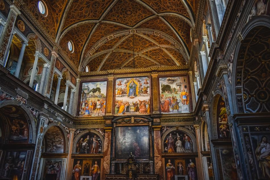 Beautiful church interior with the colorful stained glass in Milan, Italy