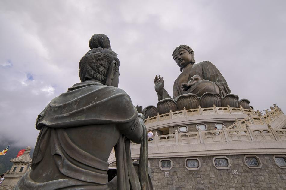 Beautiful statues of Zen in China under cloudy sky
