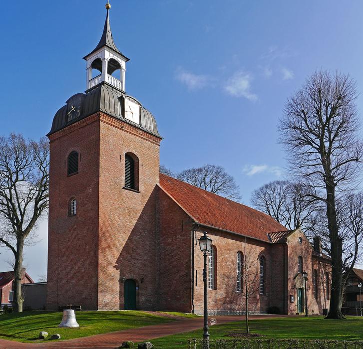 Beautiful city church among the plants in Wittmund, Germany