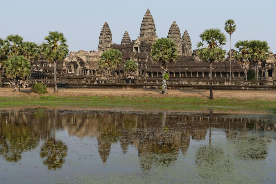 distant view of the temple complex of Wat Cambodia near the river