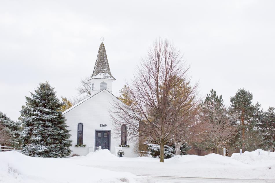 white chapel in a winter landscape