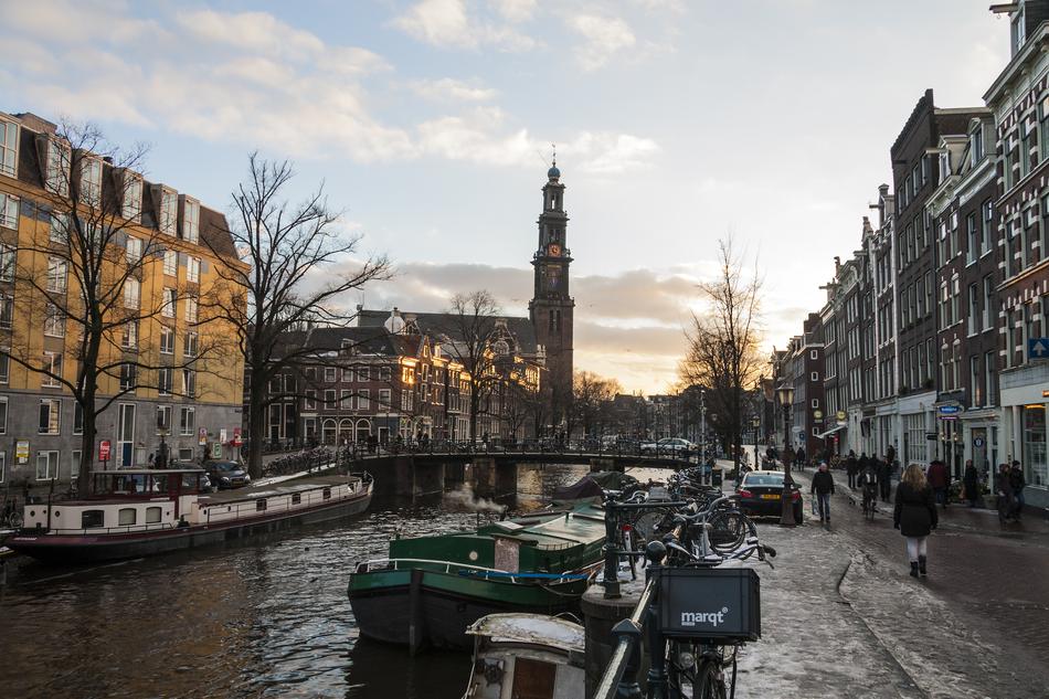 street along the river in amsterdam at dusk