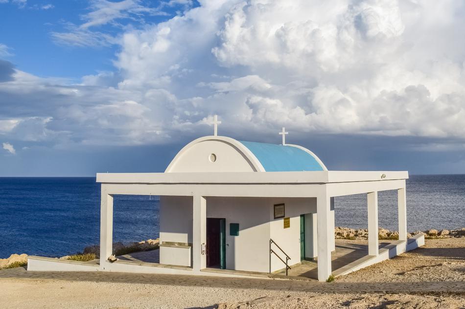 white church with blue dome on Cavo Greko