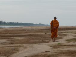 Monk Buddhism sand