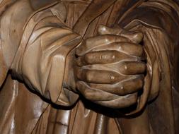 Prayer hands statue