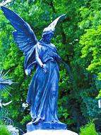 Statue Angel Wings blue at the cemetery