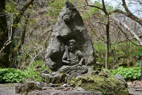 Landscape Forest and stone statue