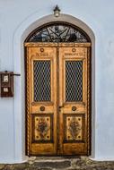 wooden door with an ornamental pattern in the church