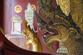 Laos Luang Prabang Temple dragon statue