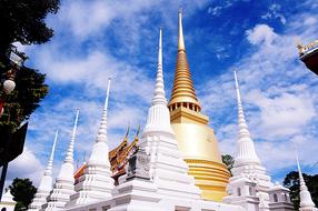 white and gold pagoda in Thailand