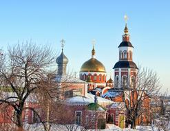distant view of the church with golden domes in winter