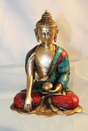 Beautiful and colorful, shiny Buddha statue in light