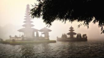 temple on the lake in the fog in Bali